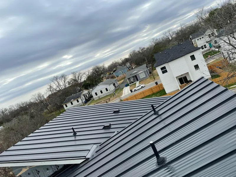 Standing seam metal roof panels with vents for Skylight Repair in Solon